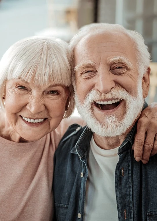 Dental implant patients smiling